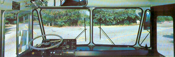A view looking out the windshield from the driver's area of a Crown Supercoach.